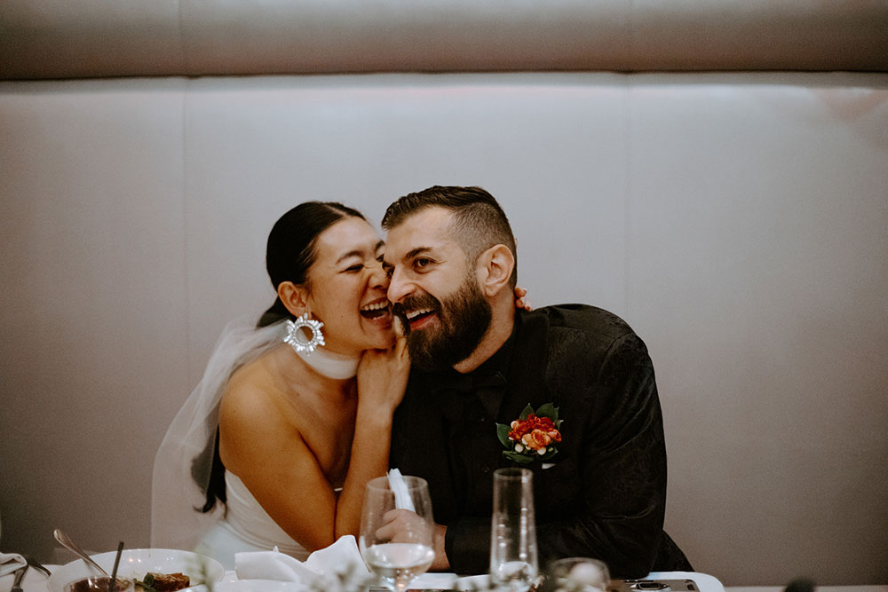 Sassafraz Yorkville Wedding Photography of the wedding couple being candid during the wedding reception