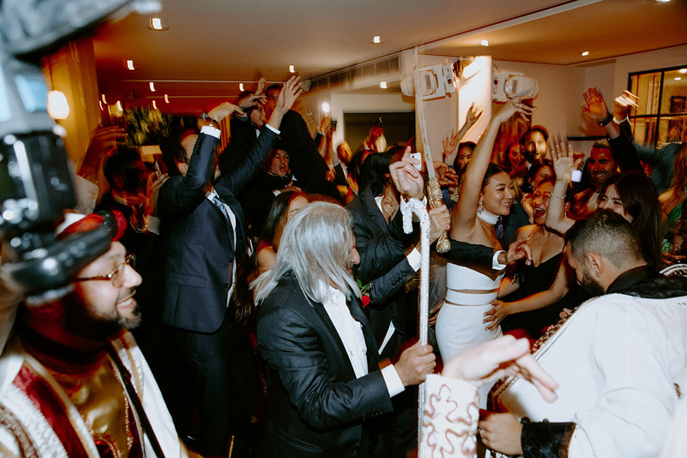 Sassafraz Yorkville Wedding Photography of the wedding party dancing on the dance floor with debke dancing