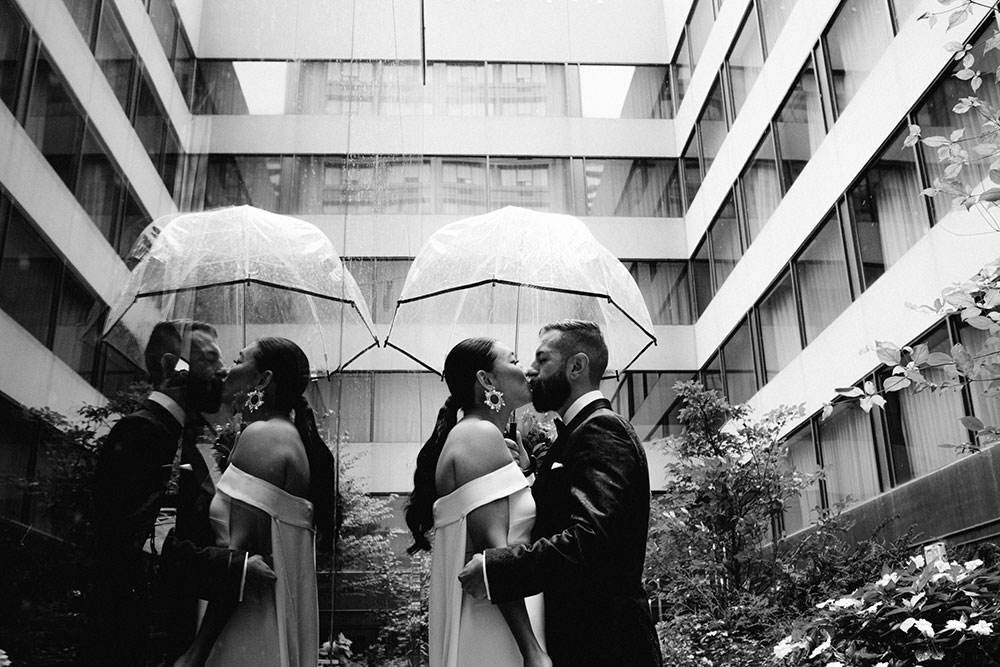 Sassafraz Yorkville Wedding Photography of the bride & groom sharing a kiss during the reveal at the W hotel 