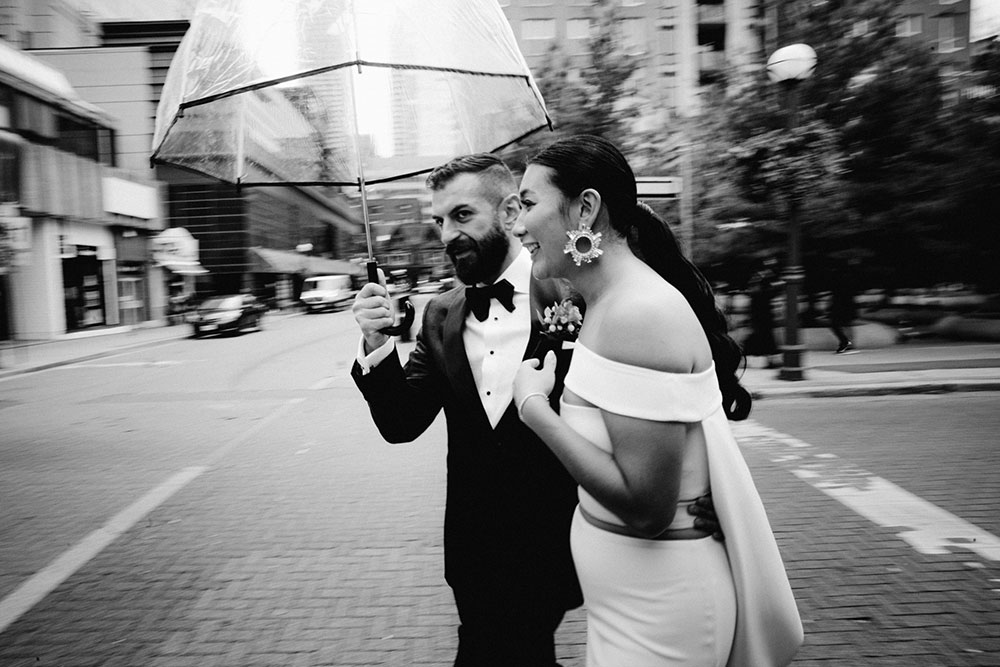 Sassafraz Yorkville Wedding Photography of the bride & groom walking candidly around yorkville