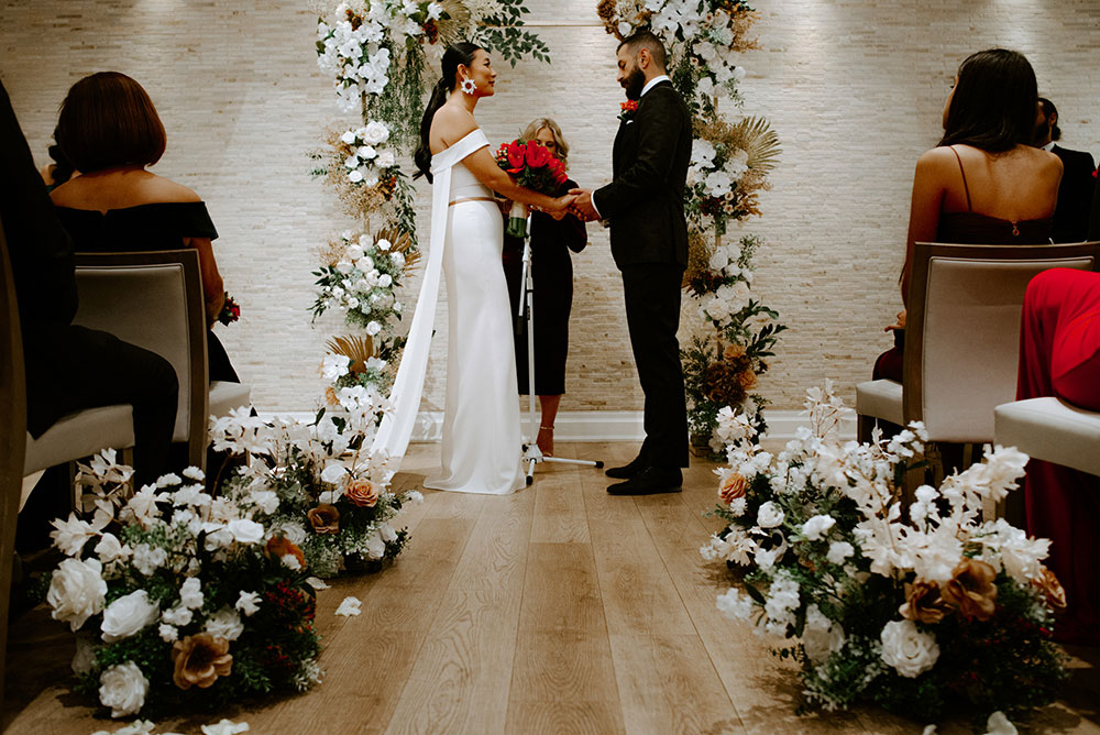 Sassafraz Yorkville Wedding Photography of the bride & groom at the altar during the wedding ceremony