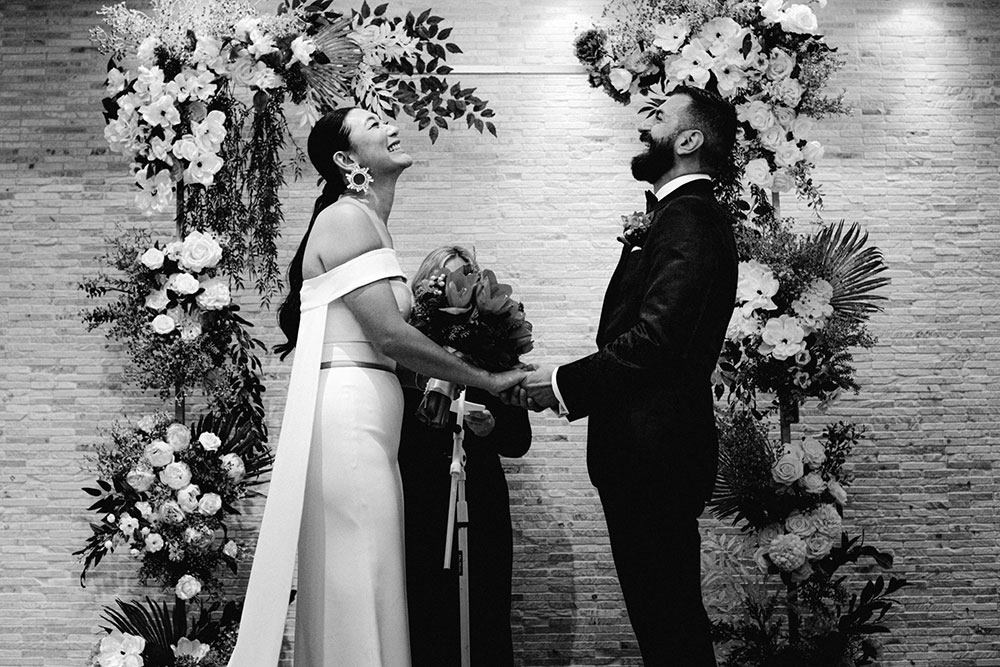 Sassafraz Yorkville Wedding Photography of the bride & groom at the altar during the wedding ceremony