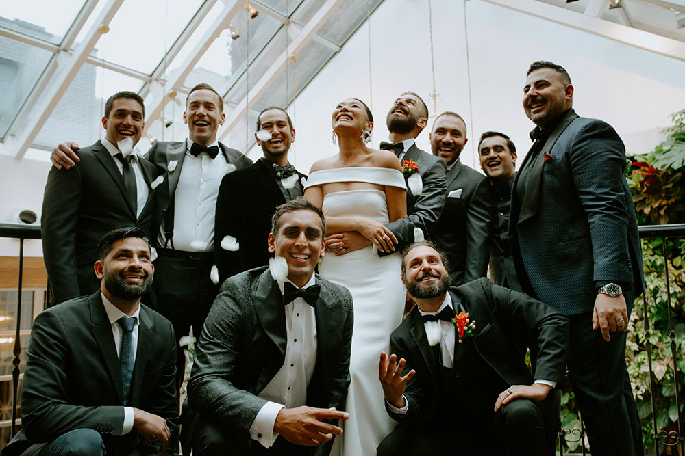 Sassafraz Yorkville Wedding Photography of the groomsmen laughing together