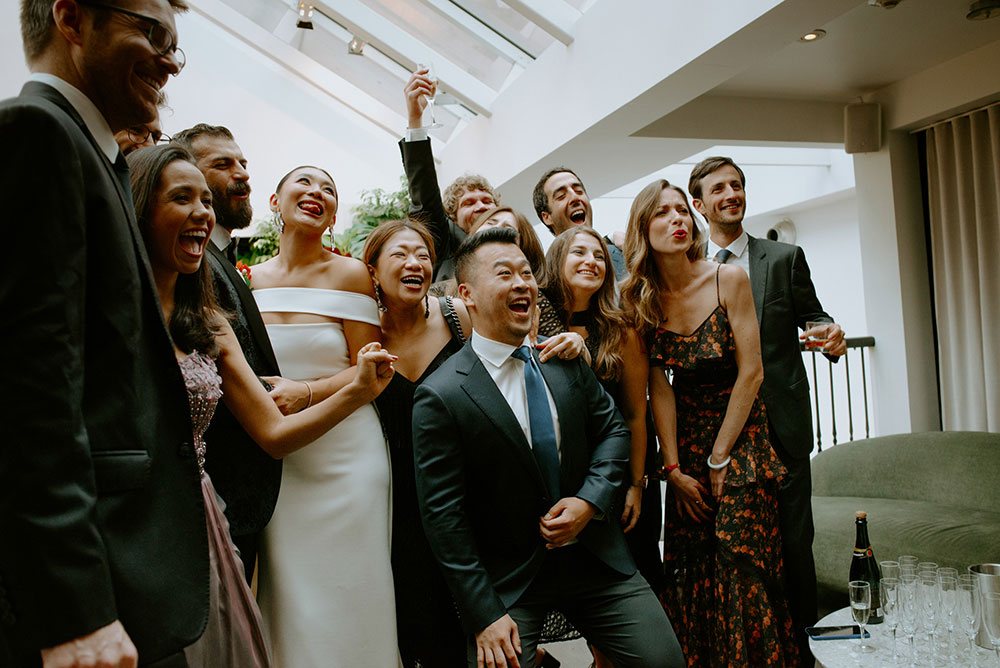 Sassafraz Yorkville Wedding Photography of the guests laughing with the bride