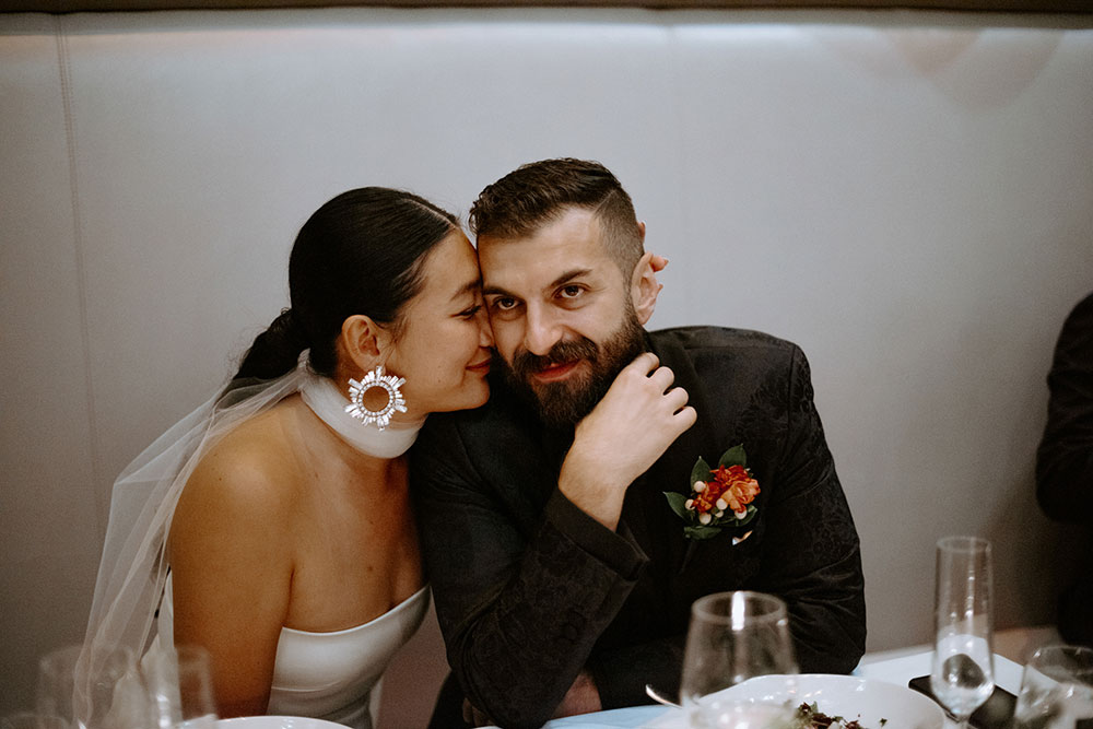 Sassafraz Yorkville Wedding Photography of the wedding couple being candid during the wedding reception