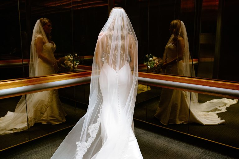 AGO Wedding Photography of a Bride in the elevator