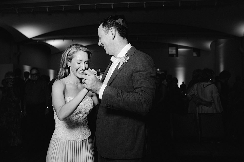 husband and wife dance together at their toronto jewish wedding