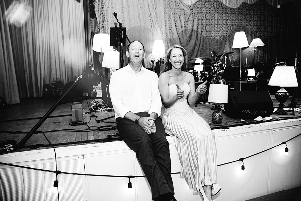 Husband & Wife enjoy their guests dancing at a Toronto Jewish Wedding