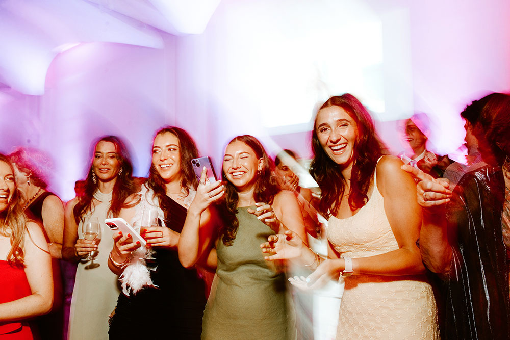 Guests enjoy while Groom performs a Rock Opera at a Toronto Jewish Wedding