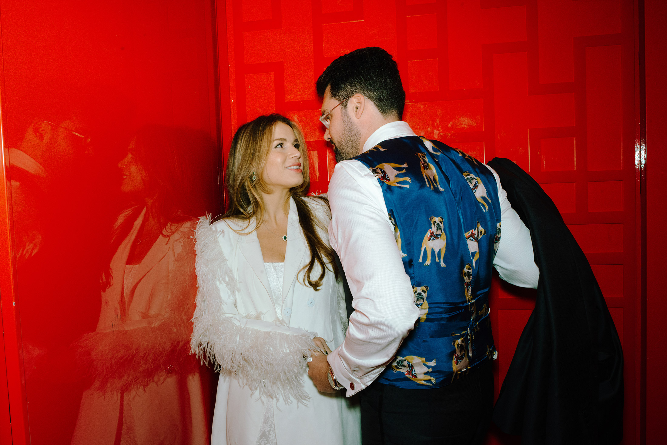 Newlyweds in red elevator at Antonio Park in Toronto