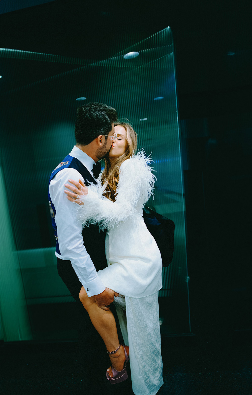 Bride and groom kiss during a photo session at their Antonio Park wedding in Toronto