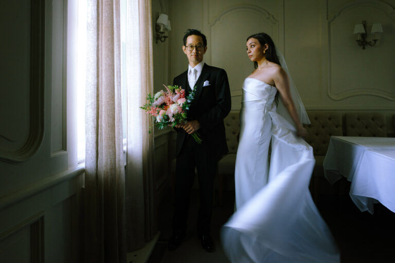 Auberge du Pommier Wedding Photography of a wedding couple posing in a very elegant editorial way within the toronto wedding venue itself