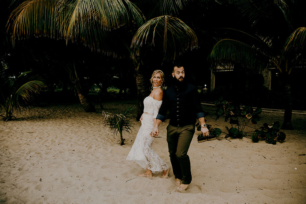 silly faces first look on the beach in placencia at this belize wedding