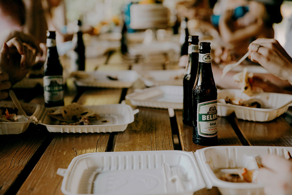 belkin beer being enjoyed  in the jungle at this belize wedding