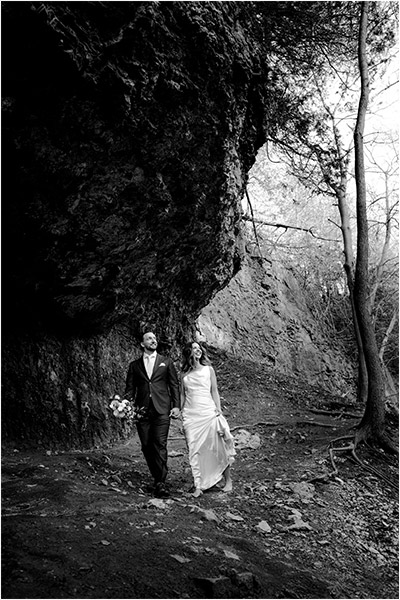 Elora elopement Wedding Couple walks barefoot in the Elora Gorge in Ontario Canada