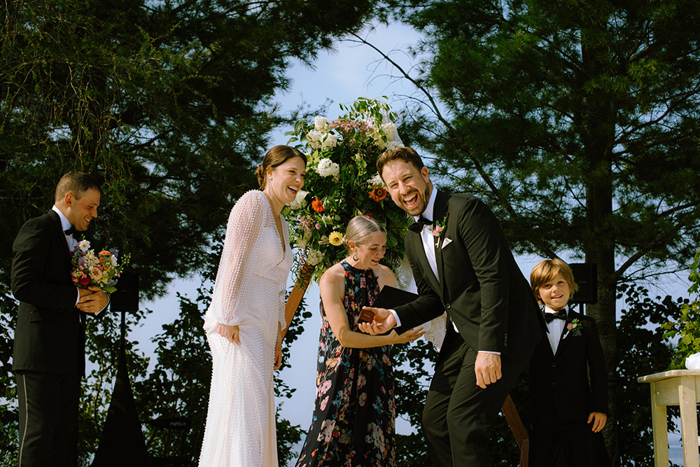 Couple laugh during their ceremony at their Northridge Inn Wedding