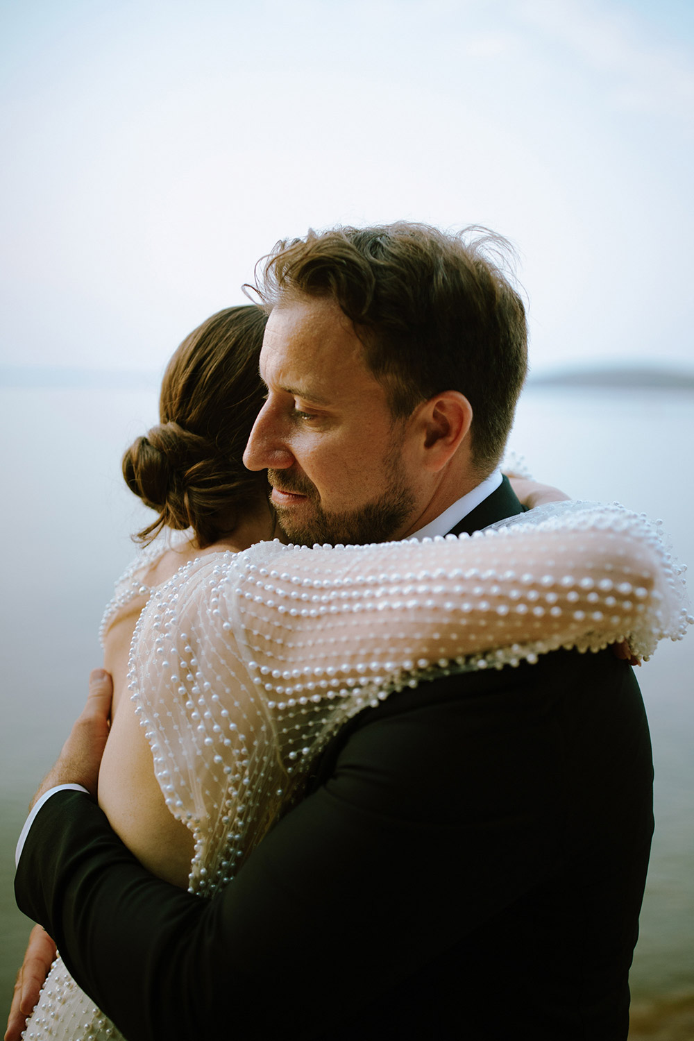 close up during sunset photos on the beach at this Northridge Inn Wedding