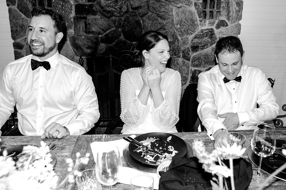 all laughter whikle the bride reacts to a speech at her Northridge Inn Wedding