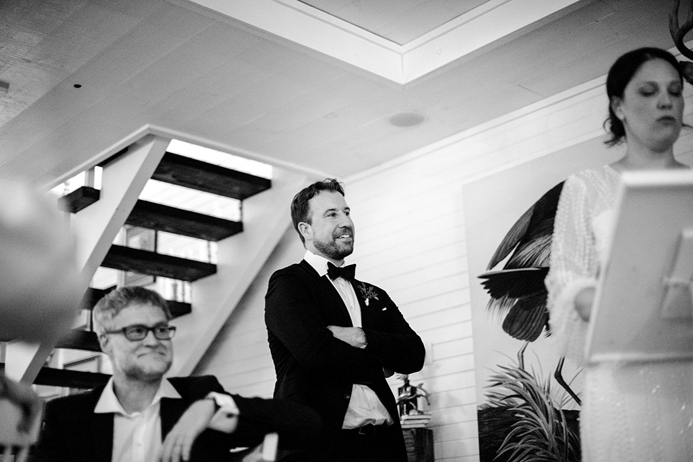 Groom admires his bride during her speech at this Northridge Inn Wedding