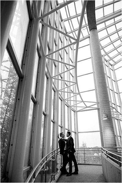 Science North Cavern Wedding Photography of a wedding couple being intimate on the famous science north ramp surrounded by beautiful window light