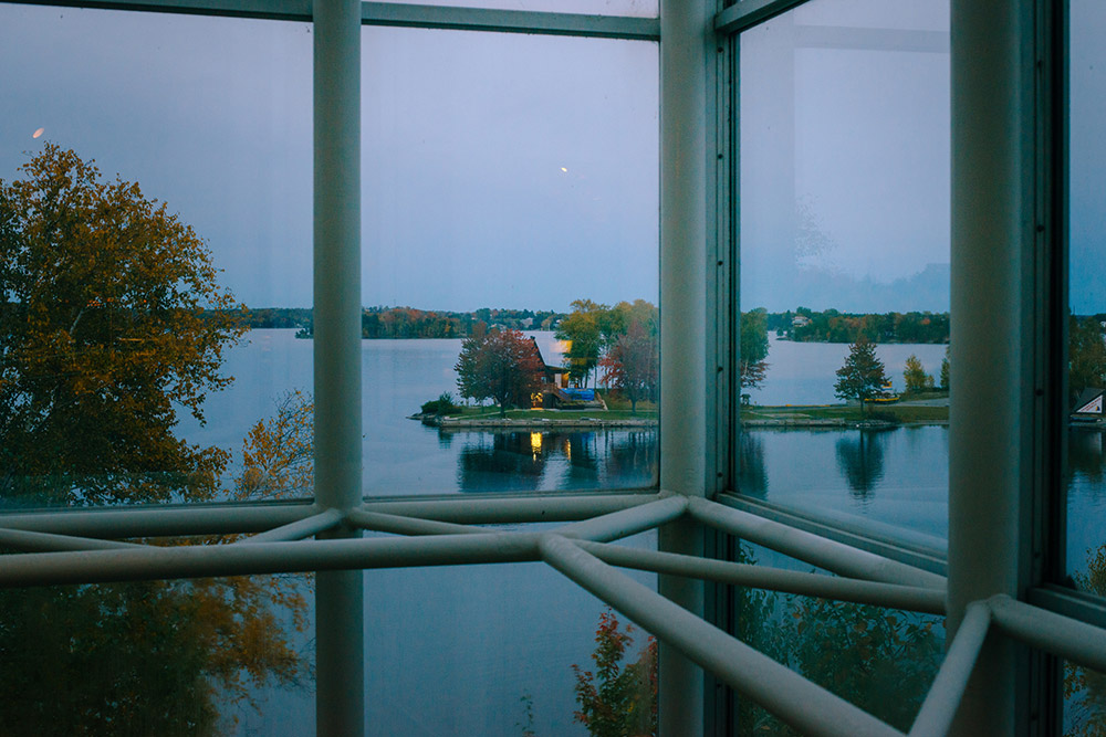 a view of the evening light over ramsey lake from the window of this science north wedding