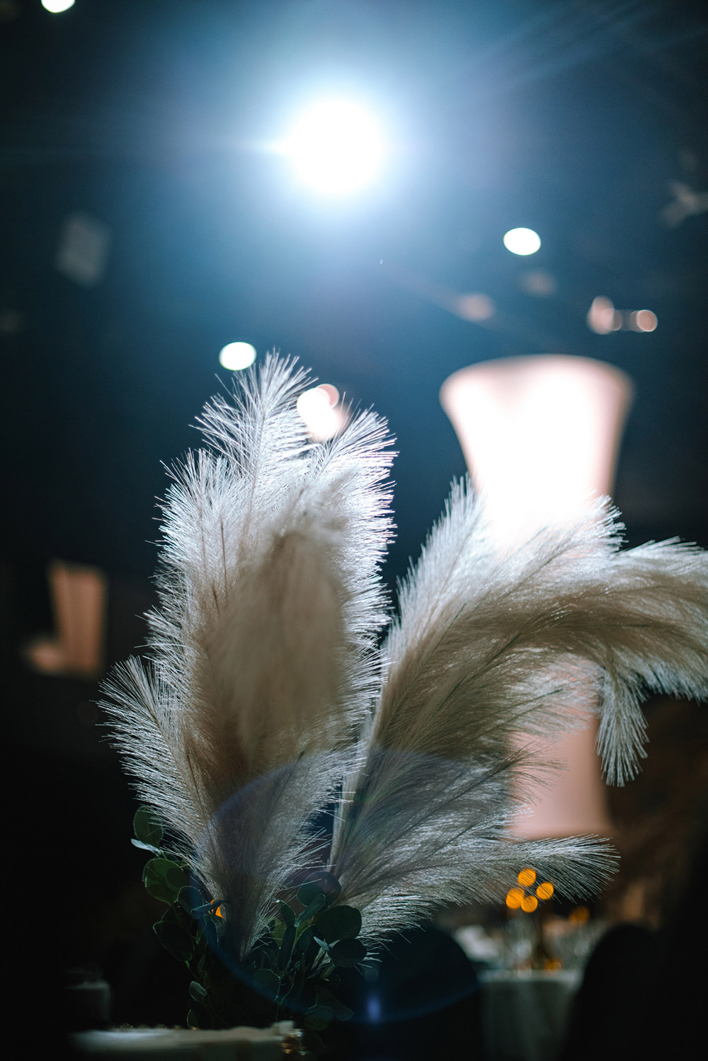 table decor feather at this science north wedding