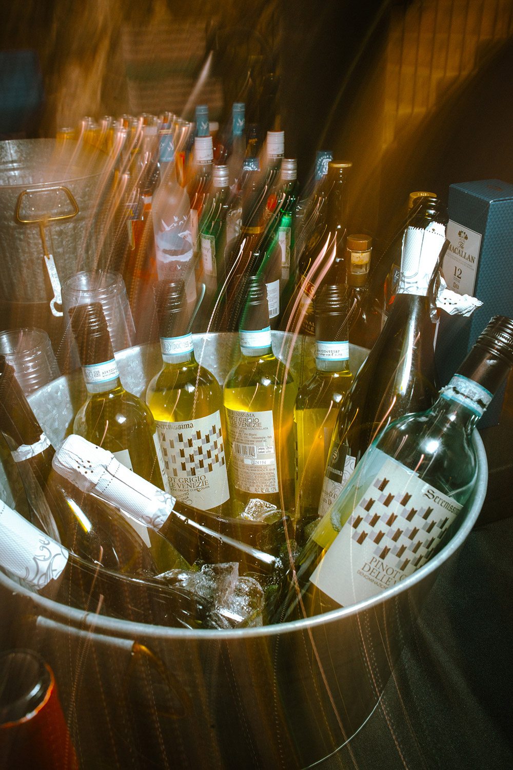 close up of wine bottles at this science north wedding