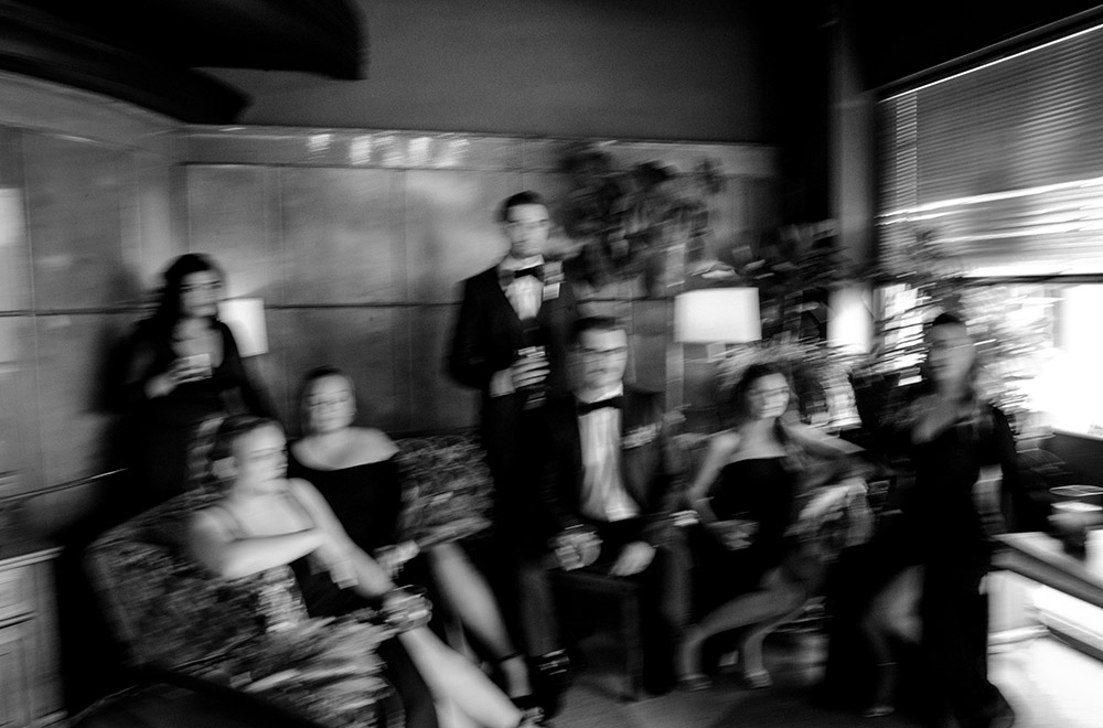 a blurry moment between set ups with the wedding party at this science north wedding