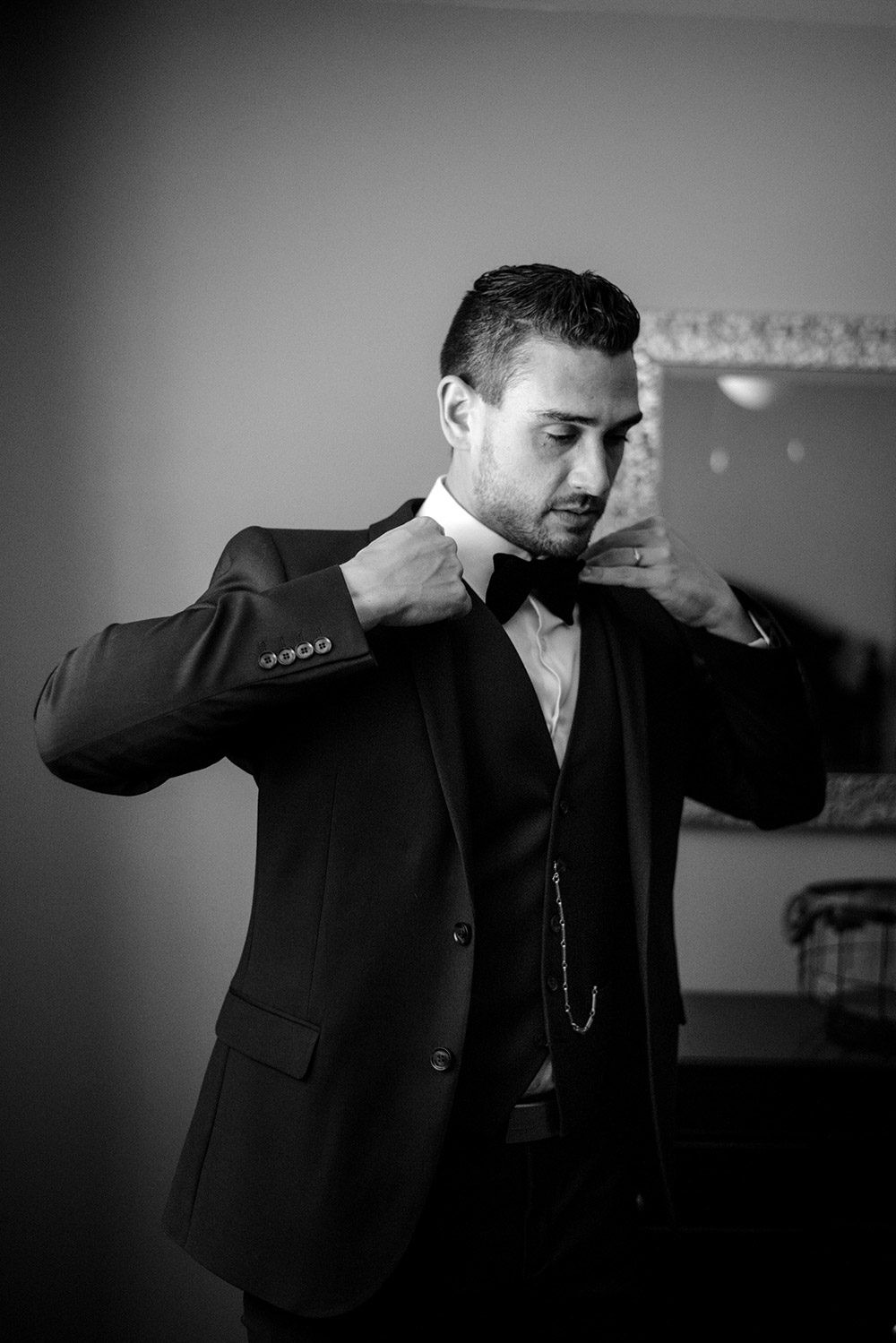 groom fixes his jacet before his science north wedding