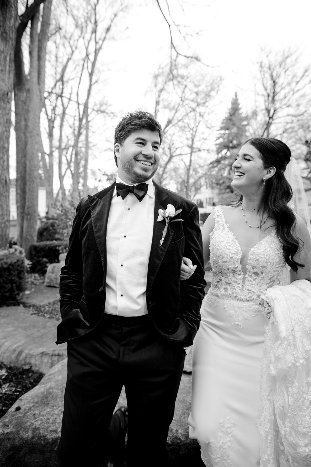 couple walk and laugh at The Doctor's House Wedding