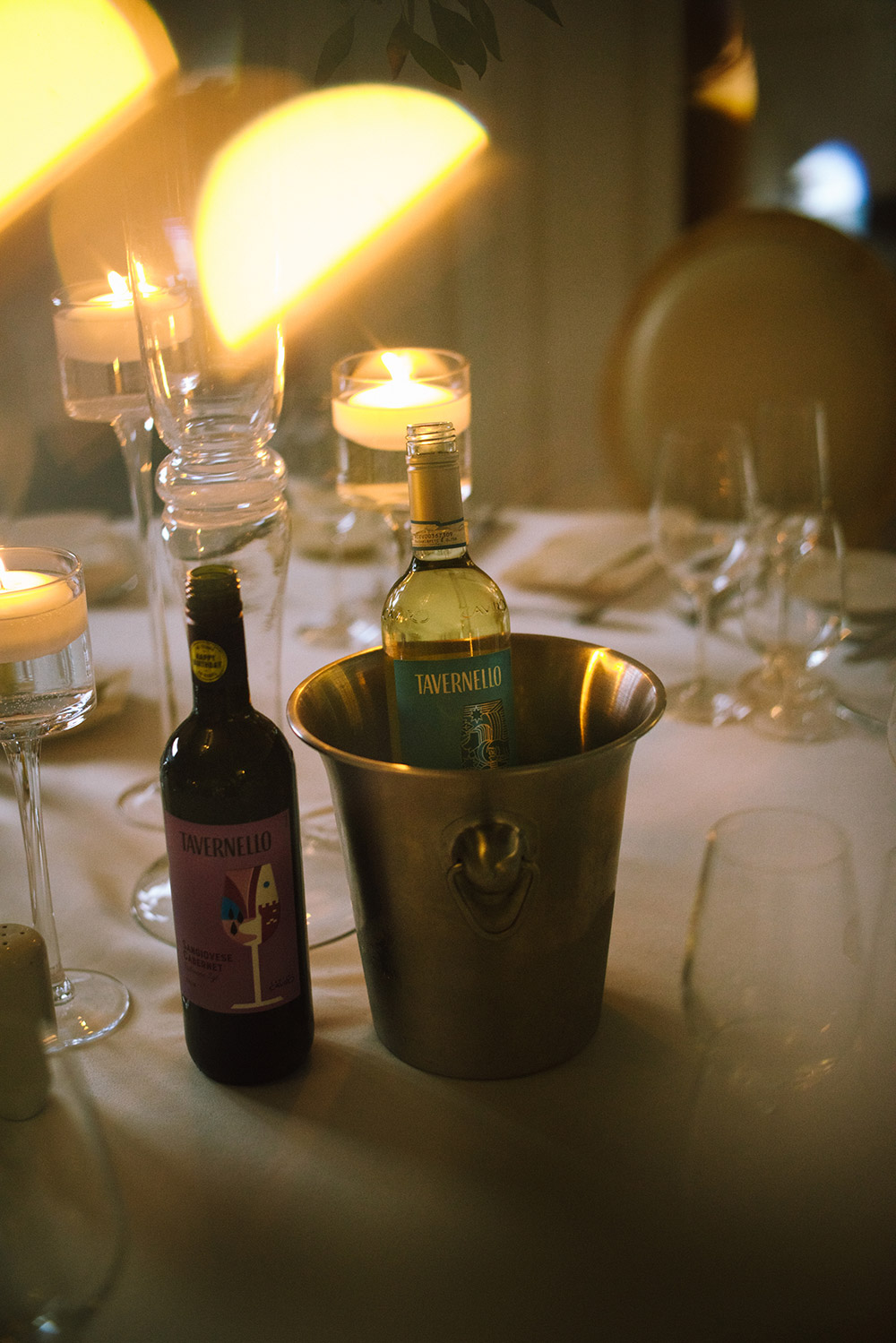 close up of white wine chilling on the table at The Doctor's House Wedding