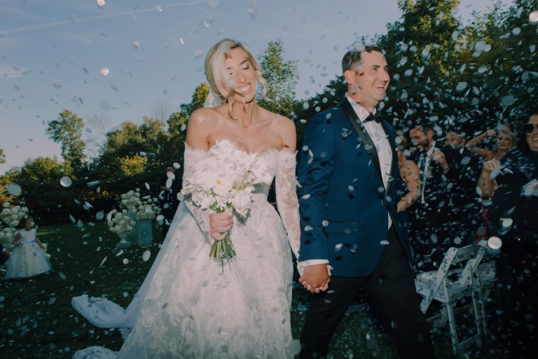 Harding Waterfront Wedding ceremony confetti send off featuring the wedding couple