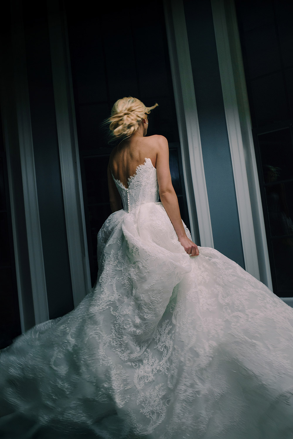 bride twists and flies around in cirlces for some fun portraits at this harding waterfront wedding